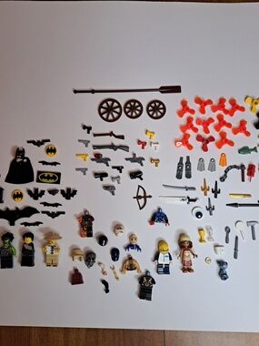 Various Lego Pieces with Figures, Weapons, & Other Accessories, over 50 pieces